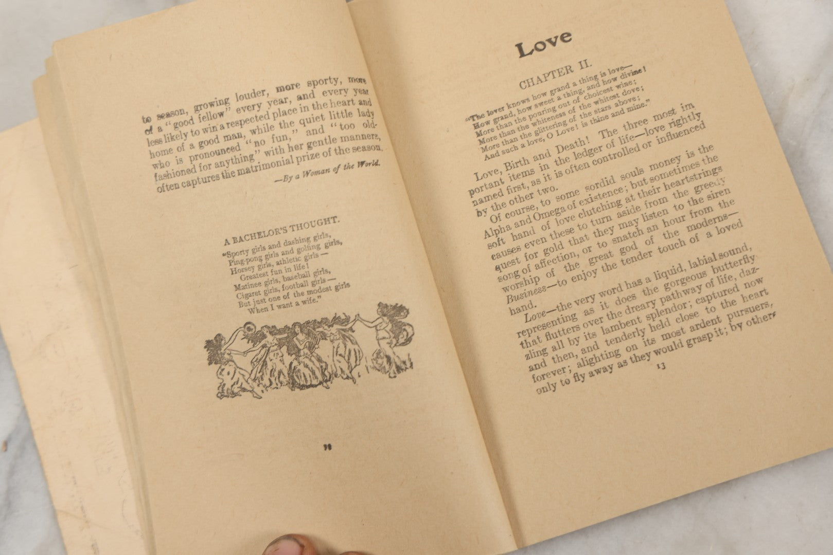 Lot 266 - "Love, Courtship, Marriage By A Woman Of The World" Antique Illustrated Paperback With Cupid Illustration On Cover And Bandaged Cat Mascot, J.S. Ogilvie, Publisher, New York, 1902, "A Hundred Ways Of Kissing Girls" Advertisement On Back Cover