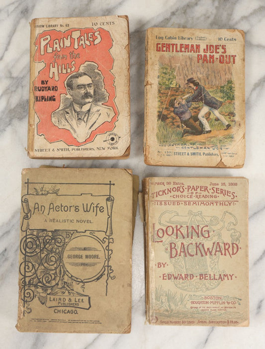 Lot 267 - Lot Of Antique Paperback Novels, "Plain Tales From The Hills" By Rudyard Kipling, "Gentleman Joe's Pan-Out" Log Cabin Library Edition, "An Actor's Wife" By George Moore, And "Looking Backward" By Edward Bellamy