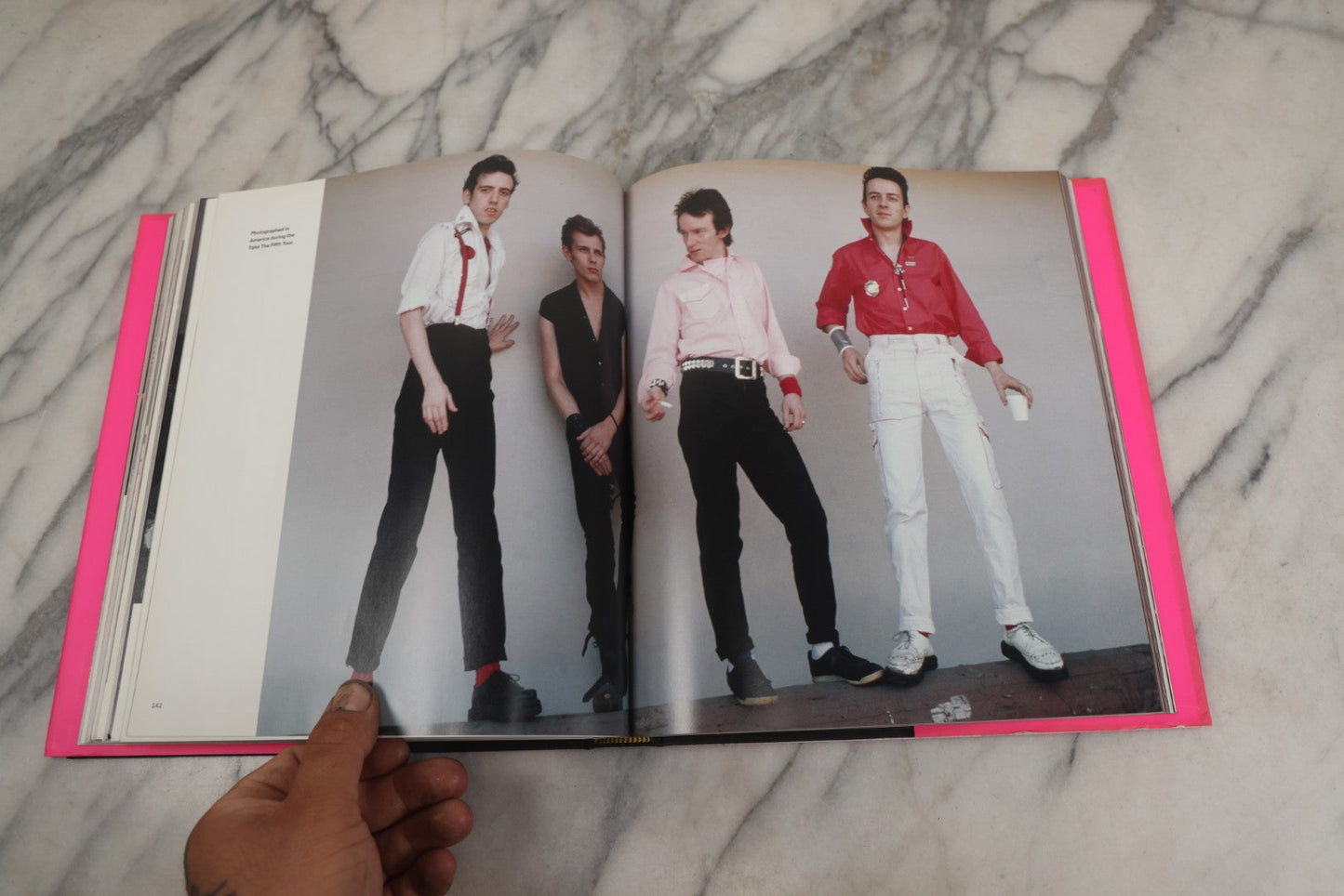 Lot 280 - "The Clash: Strummer, Jones, Simonon, Headon," Modern Book Of Band Photography And Interviews, "Original Clash Book" With Neon Pink Cover, Diorissimo Limited, Publisher, New York, 2008