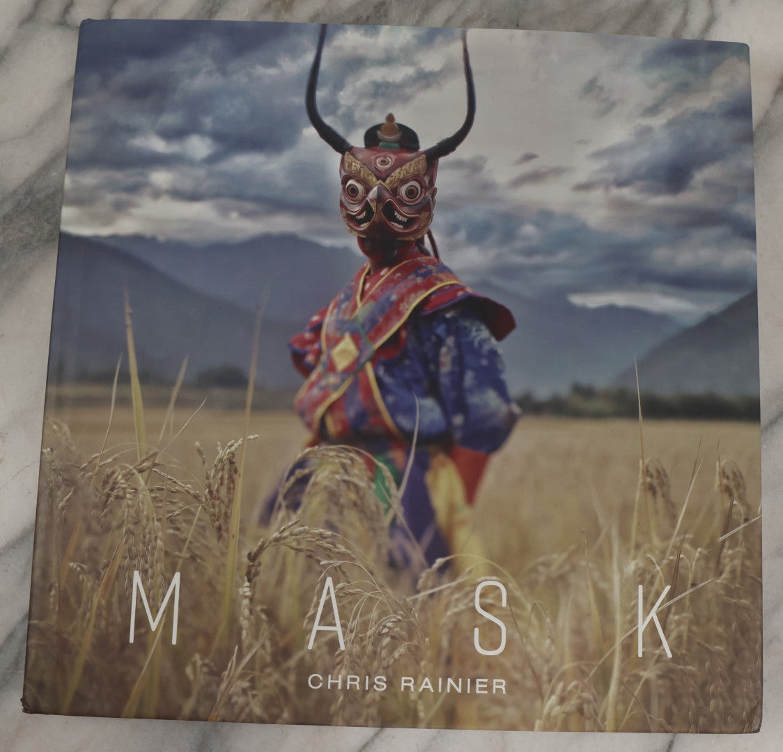 Lot 281 - "Mask" Modern Photography Book By Chris Rainier With Ethnographic Notes By Robert Welsch, Earth Aware Editions, Publishers, California, 2019