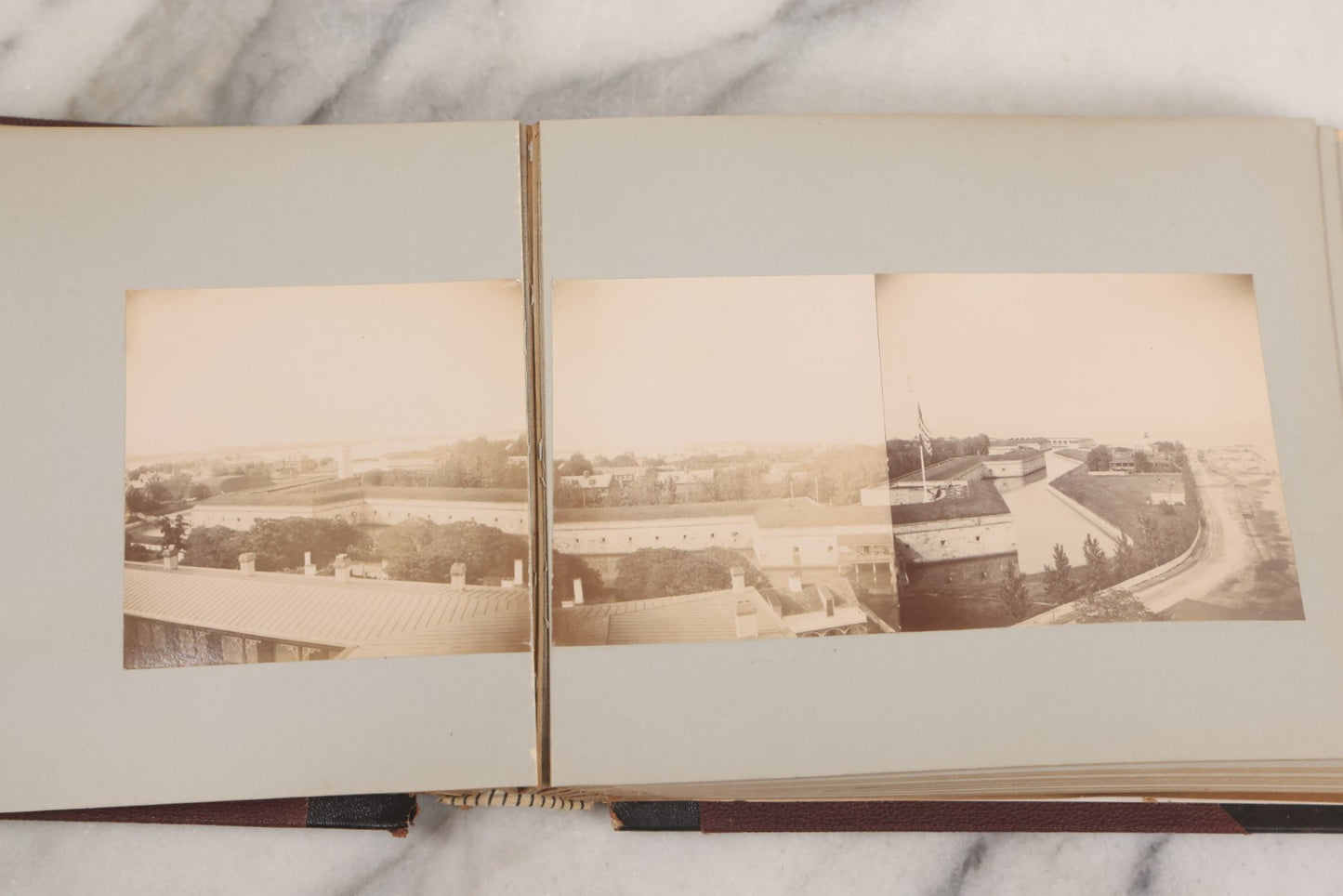 Lot 001 - Important Late 19th Century Photo Album Containing 44 Original Photographs Including Pre-Dreadnought Battleships From On Board & Shore, Washington D.C. From Atop The Washington Monument, Capitol Building, African American Men & Women, And More