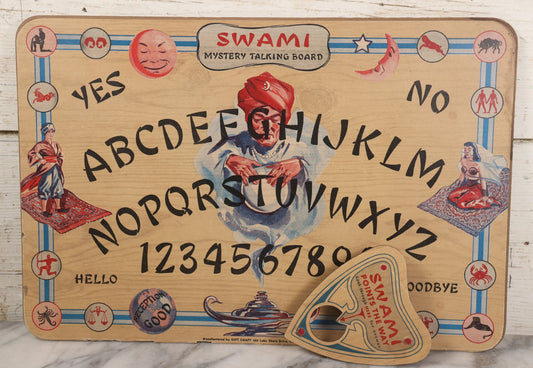 Lot 002 - Vintage Swami Mystery Talking Board Ouija Board Spirit Board With Original Planchette And Remnants Of Original Paper Sleeve, With Instruction Sheet Taped To Verso, Manufactured By Gift Craft, 666 Lake Shore Drive, Chicago, Illinois
