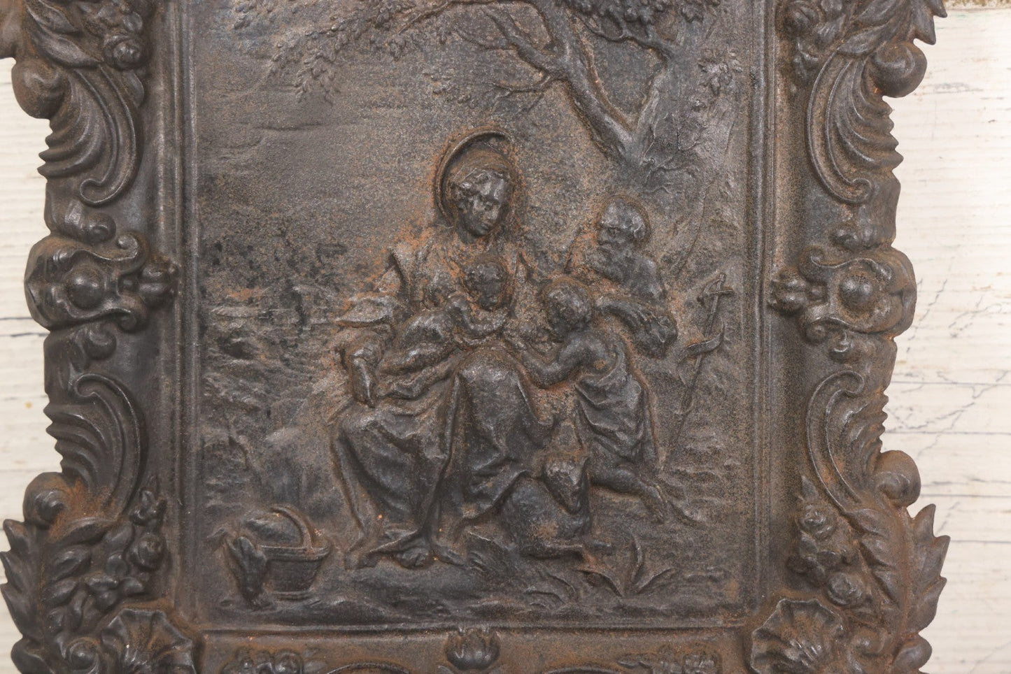 Lot 010 - Antique Cast Iron Religious Plaque Depicting The Holy Family, Virgin Mary, Baby Jesus, And John The Baptist, Wall Hanging Decor, 10-1/2" x 12-1/2"