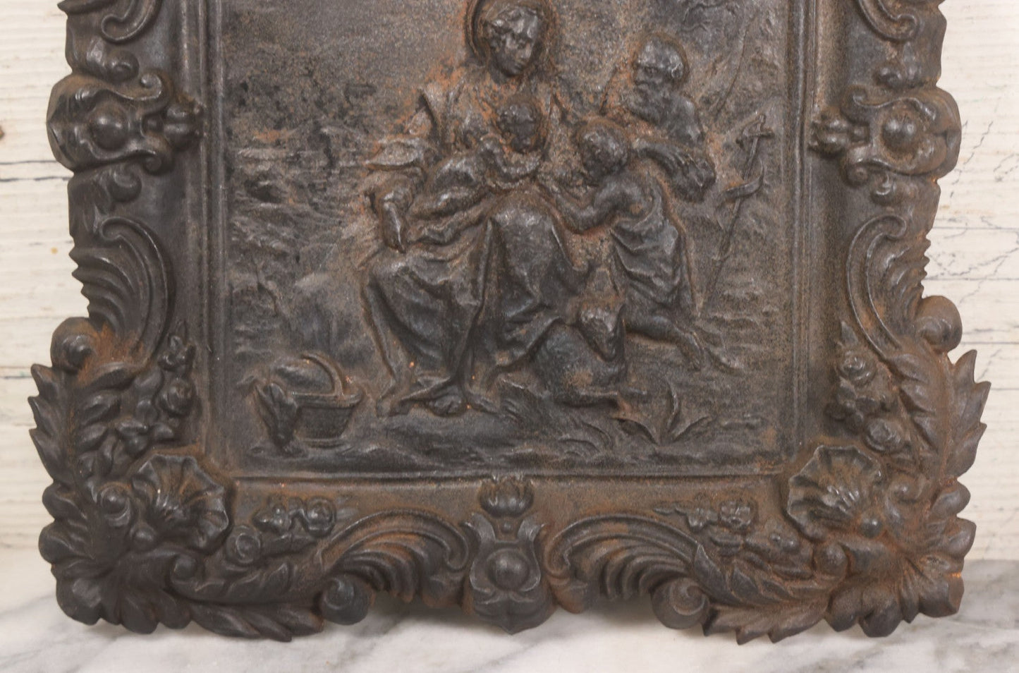 Lot 010 - Antique Cast Iron Religious Plaque Depicting The Holy Family, Virgin Mary, Baby Jesus, And John The Baptist, Wall Hanging Decor, 10-1/2" x 12-1/2"