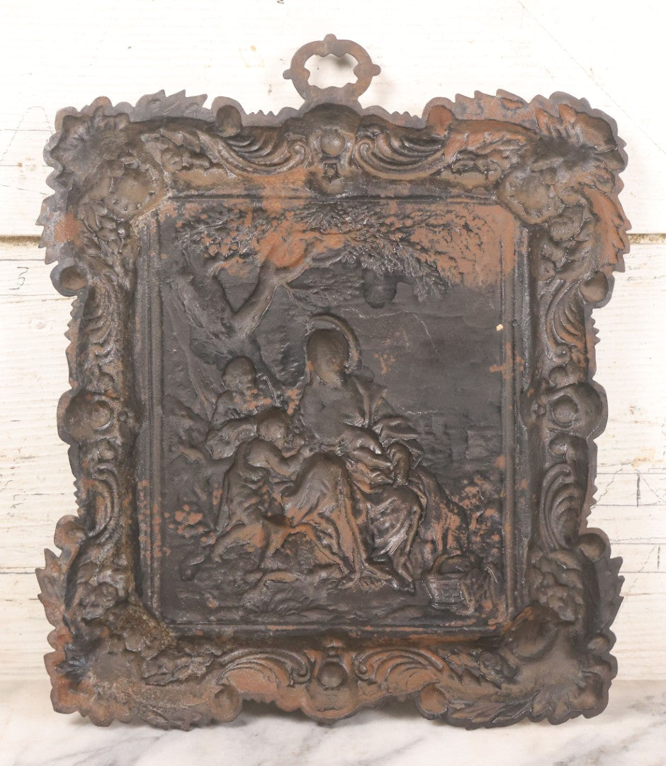 Lot 010 - Antique Cast Iron Religious Plaque Depicting The Holy Family, Virgin Mary, Baby Jesus, And John The Baptist, Wall Hanging Decor, 10-1/2" x 12-1/2"