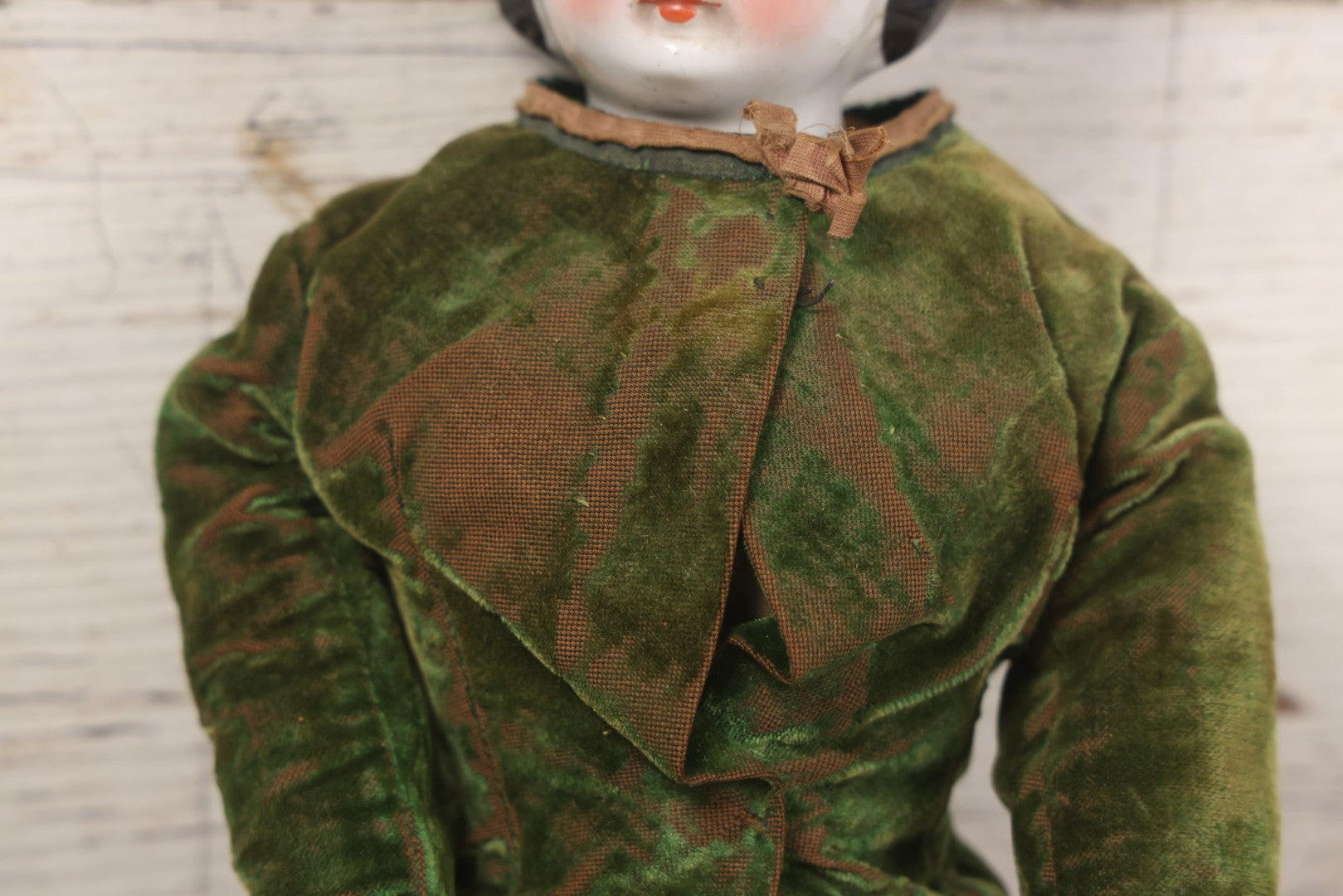 Lot 011 - Antique Victorian China Head Doll With Custom Outfit Including Velvet Blazer, Green, Pink, Yellow, And Black Striped Skirt, Knit Underskirt, White And Pink Pantyhose, And Black Stockings, 20" H
