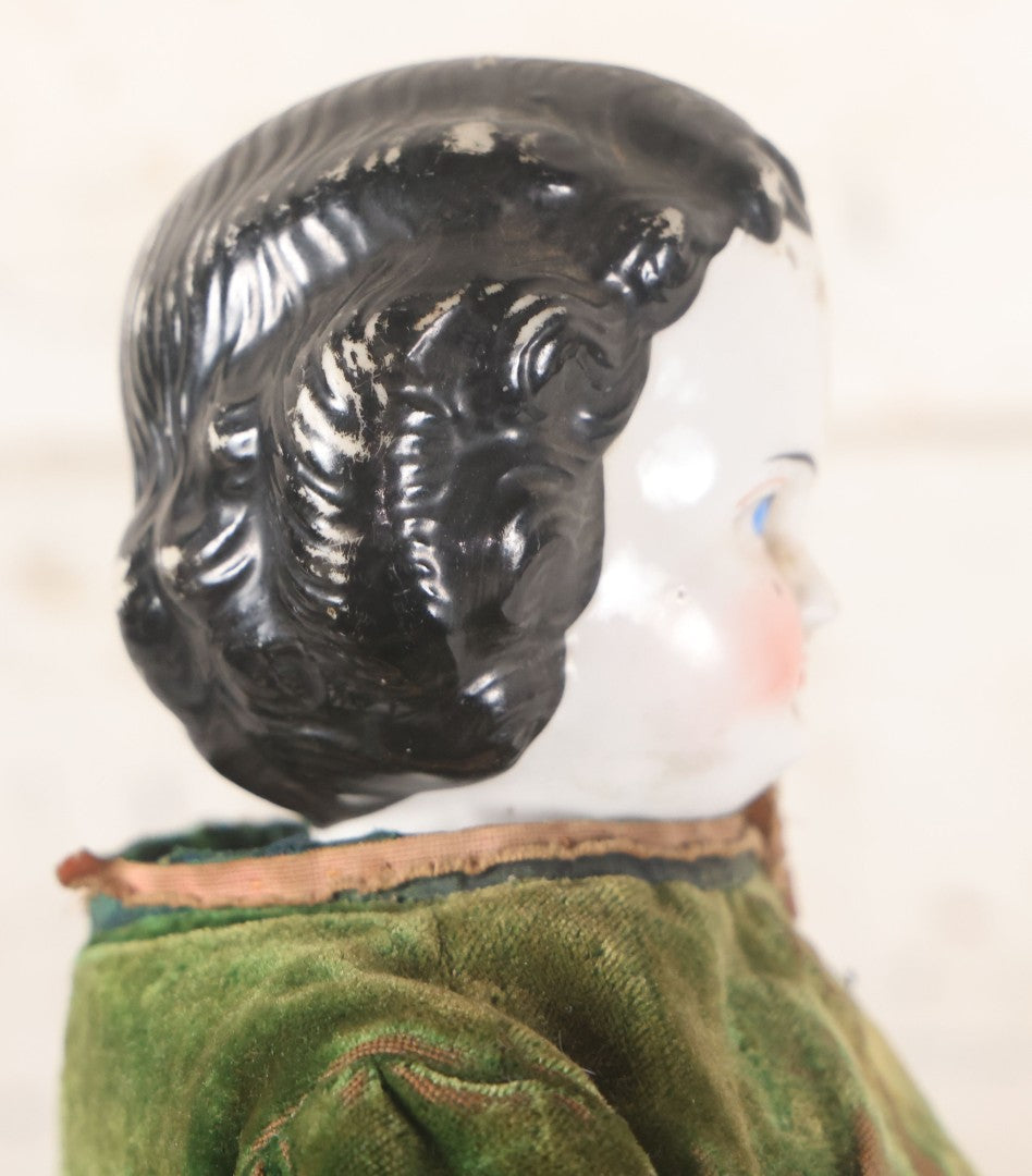 Lot 011 - Antique Victorian China Head Doll With Custom Outfit Including Velvet Blazer, Green, Pink, Yellow, And Black Striped Skirt, Knit Underskirt, White And Pink Pantyhose, And Black Stockings, 20" H