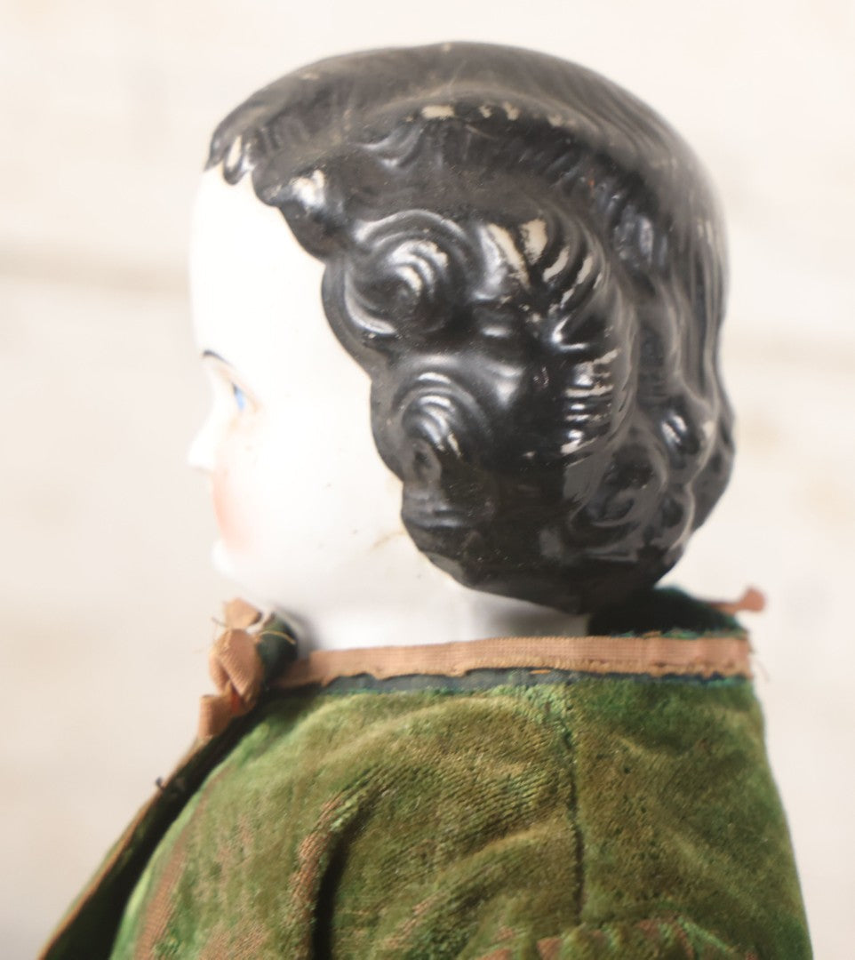 Lot 011 - Antique Victorian China Head Doll With Custom Outfit Including Velvet Blazer, Green, Pink, Yellow, And Black Striped Skirt, Knit Underskirt, White And Pink Pantyhose, And Black Stockings, 20" H