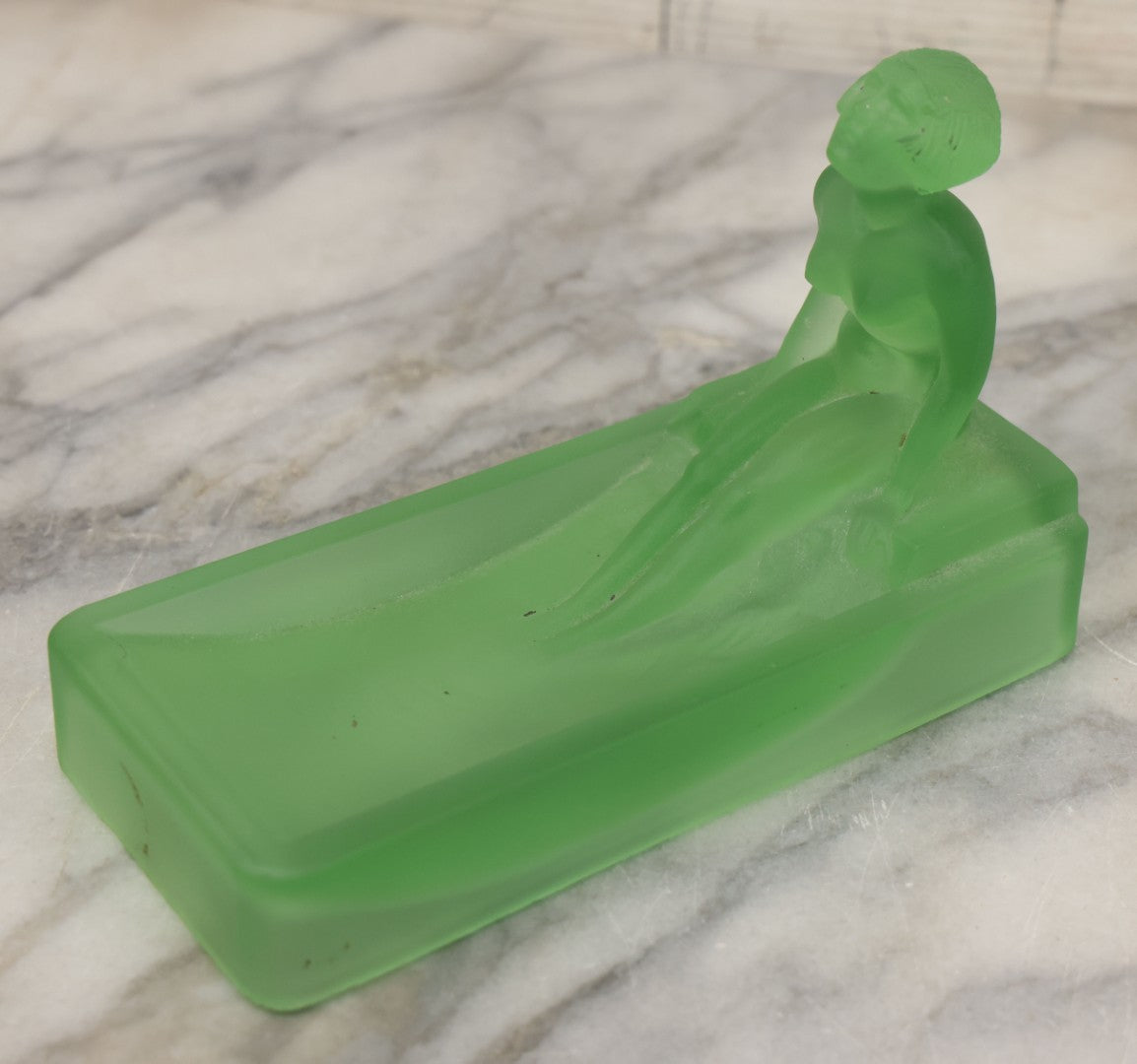 Lot 012 - Vintage Art Deco Uranium Satin Glass Trinket Or Soap Dish, Molded In Green Glass With Seated Nude Female Figure, Circa 1920s–1930s Glows Under Black Light