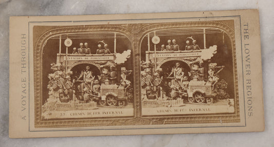 Lot 016 - Antique Stereoview Stereo Optic 3D Diablerie Photo Card, "Chemin De Fer Infernal” (Infernal Railway, Railway To Hell), Skeletons And Devils At Purgatory Train Station, "A Voyage Through The Lower Regions"