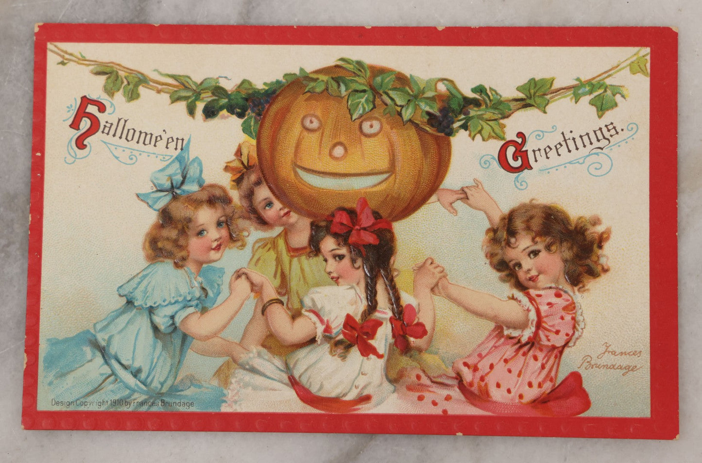 Lot 020 - Antique Embossed Halloween Postcard, Circle Of Little Girls Dancing Around Jack-O-Lantern J.O.L. Pumpkin, Illustrated By Frances Brundage, Copyright 1910, Samuel Gabriel Sons & Company, Halloween Series No. 120, Printed In Germany