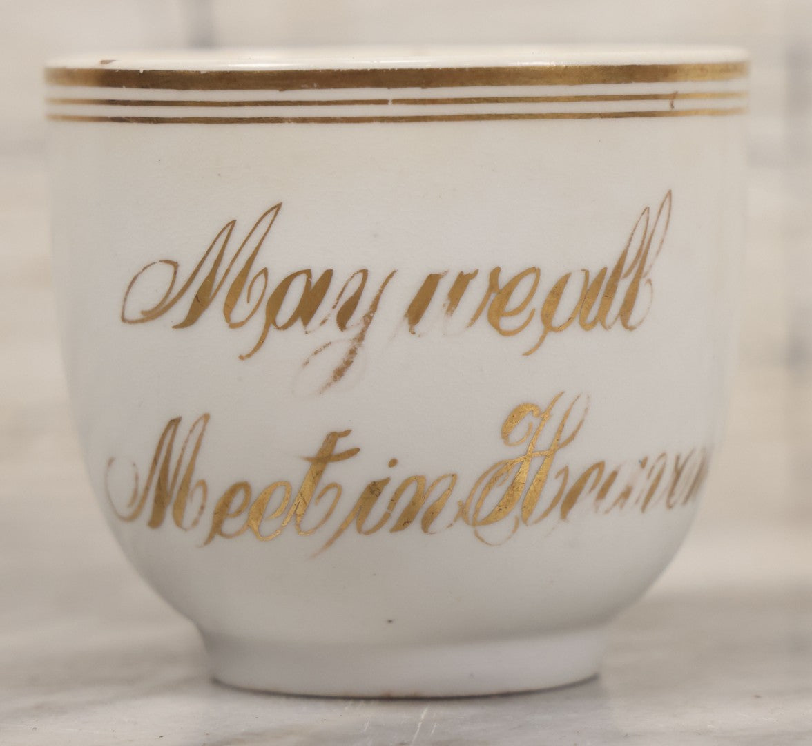 Lot 021 - Antique Porcelain Teacup With Motto "May We All Meet In Heaven," White Porcelain With Gold Painted Lettering, Striping