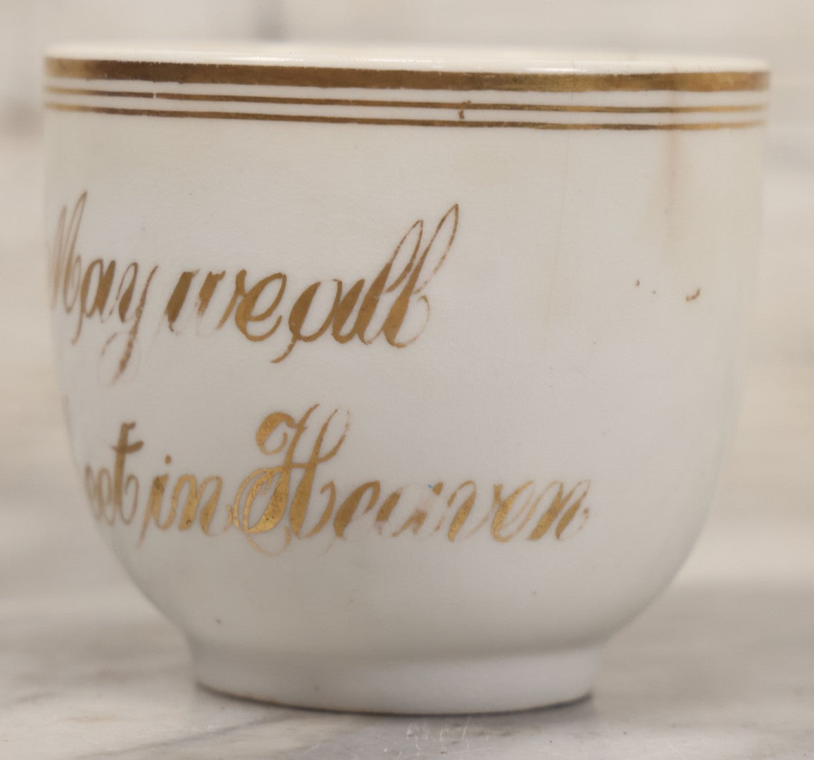 Lot 021 - Antique Porcelain Teacup With Motto "May We All Meet In Heaven," White Porcelain With Gold Painted Lettering, Striping