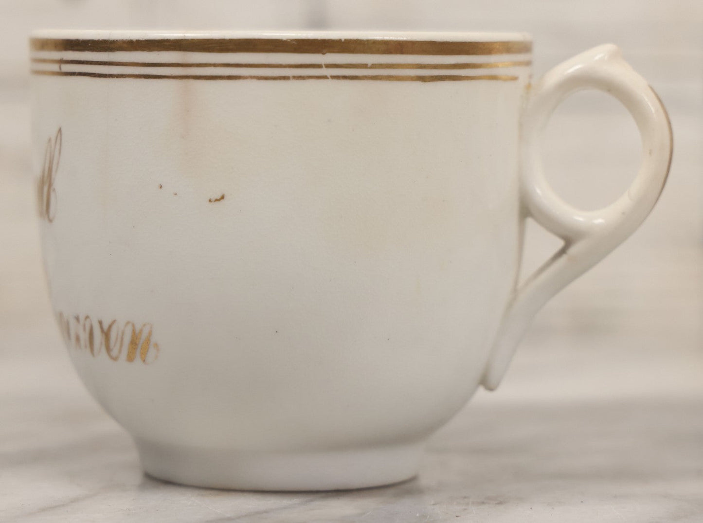 Lot 021 - Antique Porcelain Teacup With Motto "May We All Meet In Heaven," White Porcelain With Gold Painted Lettering, Striping