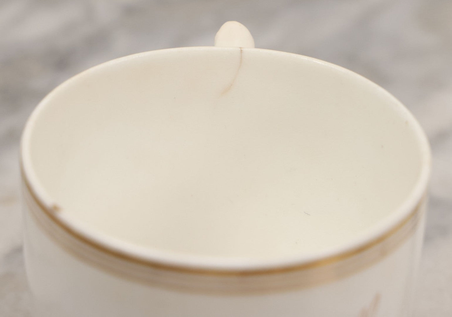 Lot 021 - Antique Porcelain Teacup With Motto "May We All Meet In Heaven," White Porcelain With Gold Painted Lettering, Striping