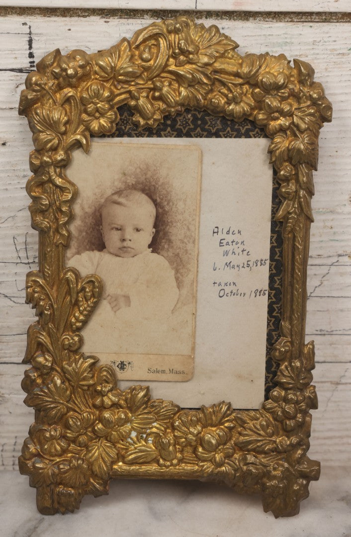Lot 026 - Antique Pressed Brass Frame Containing A Carte De Visite C.D.V. Photograph Of Alden Eaton White Taken October 1885, With Obituary Of Mother Mary Howe White On Verso, Died From Complications During Childbirth, Photo Taken Salem, Massachusetts