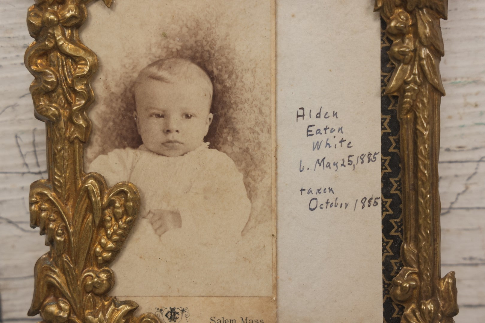 Lot 026 - Antique Pressed Brass Frame Containing A Carte De Visite C.D.V. Photograph Of Alden Eaton White Taken October 1885, With Obituary Of Mother Mary Howe White On Verso, Died From Complications During Childbirth, Photo Taken Salem, Massachusetts