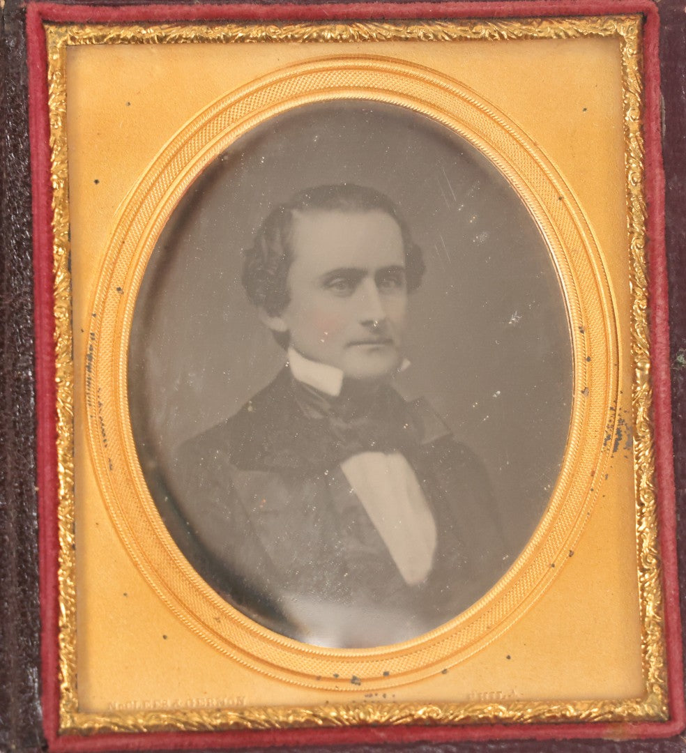 Lot 027 - Antique 1/6th Plate Daguerreotype Photograph Of A Middle Aged Man, Photographed By McClees & Germon, Philadelphia Pennsylvania, Marked On Brass Mat, In Full Intact Leatherette Union Case, Circa 1850
