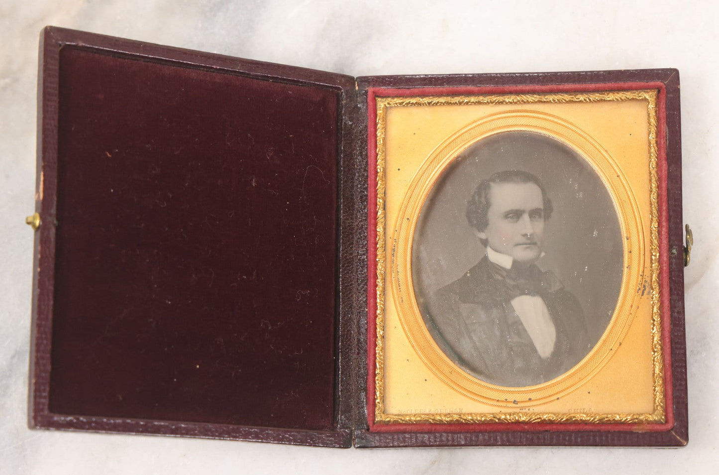 Lot 027 - Antique 1/6th Plate Daguerreotype Photograph Of A Middle Aged Man, Photographed By McClees & Germon, Philadelphia Pennsylvania, Marked On Brass Mat, In Full Intact Leatherette Union Case, Circa 1850