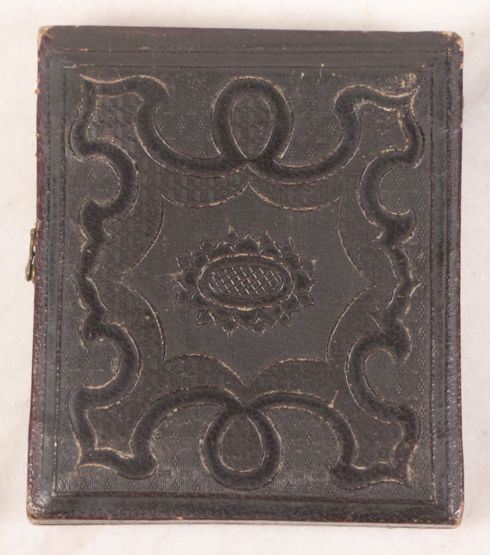 Lot 028 - Antique 1/6th Plate Daguerreotype Photograph Of A Middle Aged Man With A Chin Strap Beard, Photographed By Bell & Clayton, Philadelphia, Marked On Case Pillow, In Full Intact Leatherette Union Case, Circa 1855