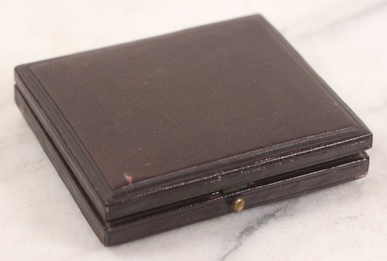 Lot 033 - Antique 1/6th Plate Ambrotype Photograph Of A Young Man With Mustache, Slight Smile, Photographed By I. Rehn, Philadelphia, With Note From Rehn In Case Regarding Care Of Ambrotypes, In Intact Leatherette Union Case, Note Loss To Black Varnish