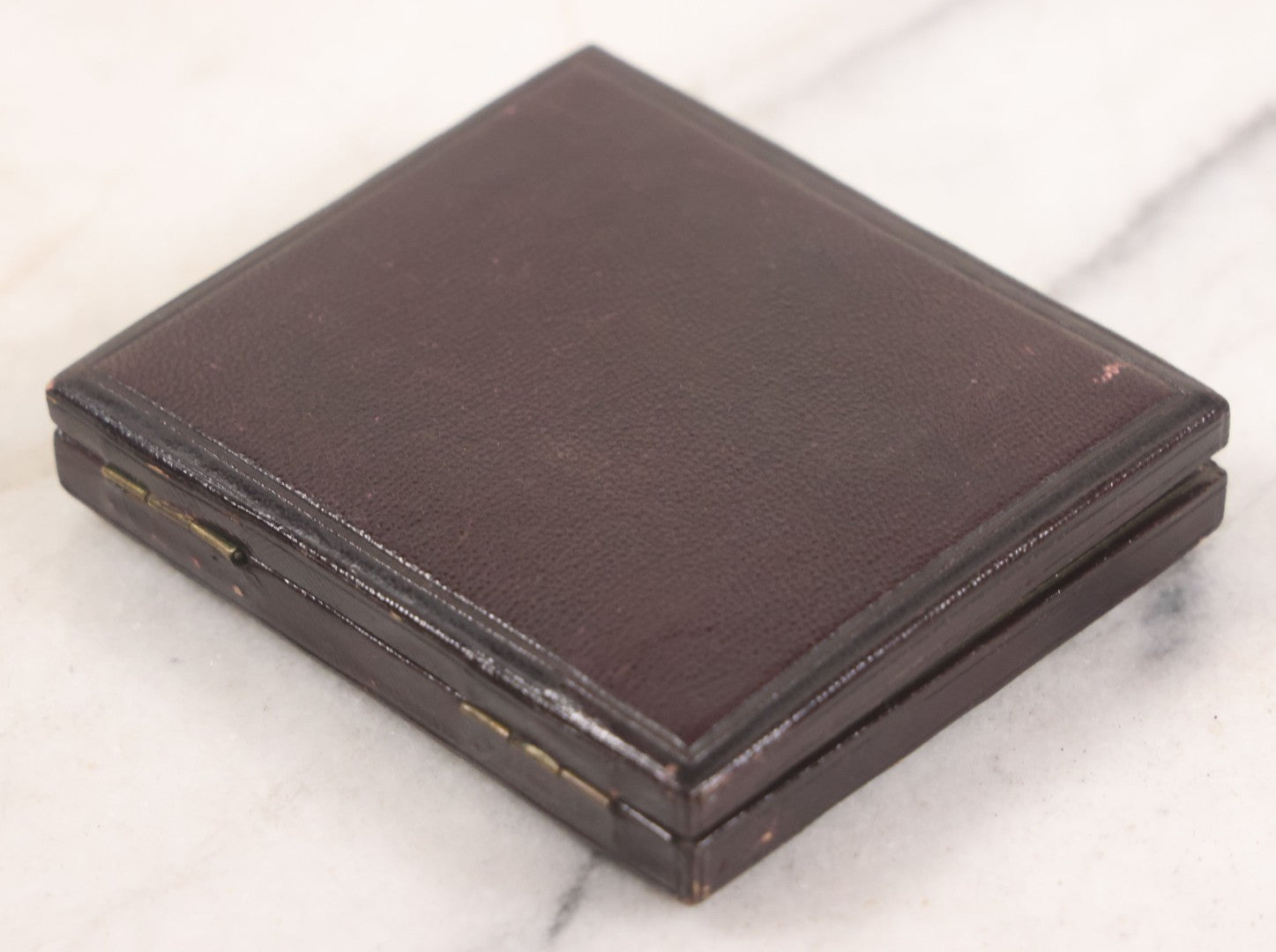 Lot 033 - Antique 1/6th Plate Ambrotype Photograph Of A Young Man With Mustache, Slight Smile, Photographed By I. Rehn, Philadelphia, With Note From Rehn In Case Regarding Care Of Ambrotypes, In Intact Leatherette Union Case, Note Loss To Black Varnish