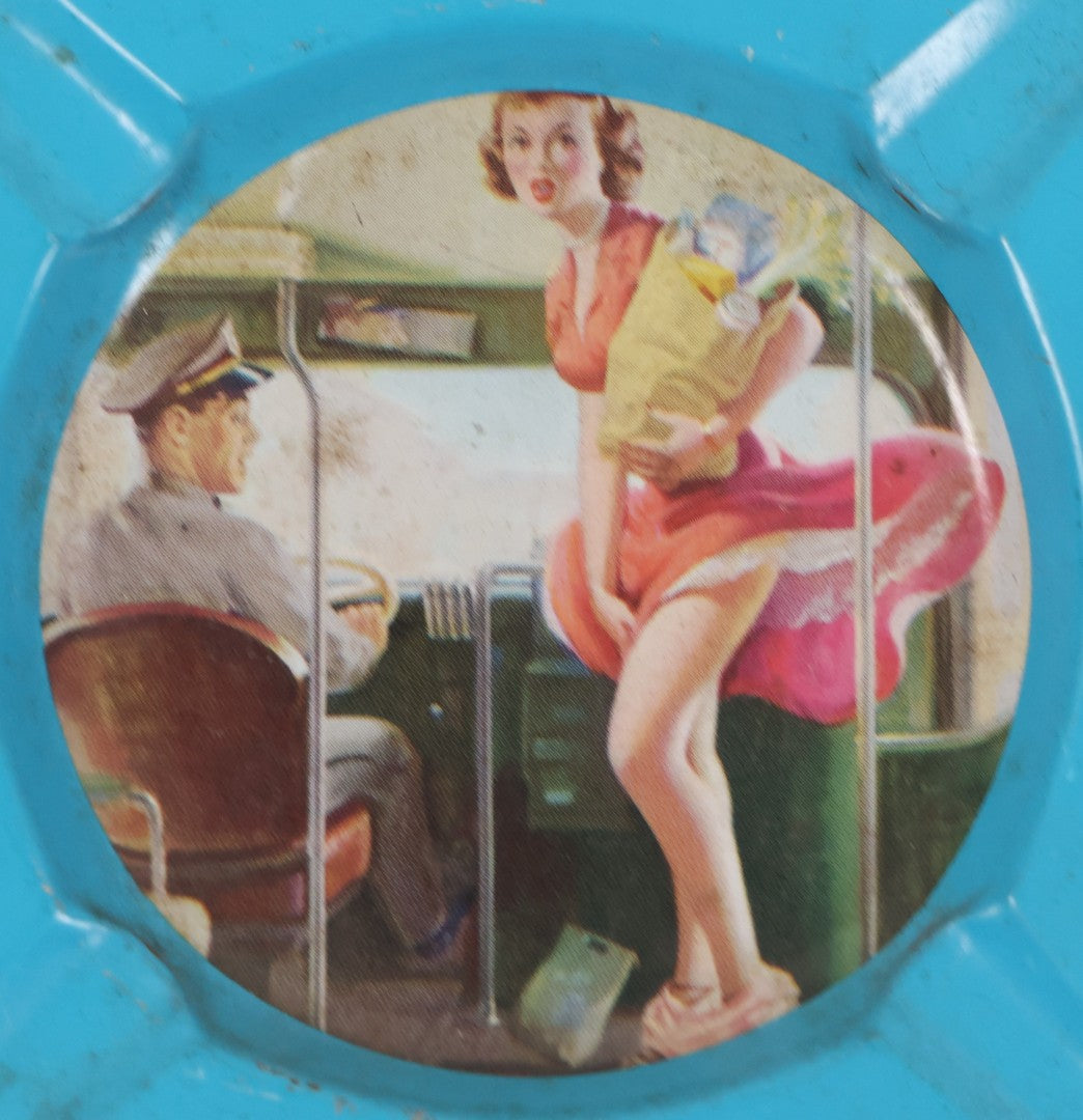 Lot 036 - Vintage Tin Lithograph Pin-Up Advertising Ashtray, With Woman Getting On Bus, Skirt Blowing In The Wind, Advertising Tuttle Cleaners, Inc., Chicago, "Quality Service, Stay Neat And Trim," 4-1/8" x 4-1/8"