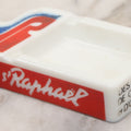 Lot 038 - Vintage St. Raphaël French Aperitif Milk Glass Advertising Ashtray, Red & Blue Logo, “Des Écorces De Quinquina & D'Oranges Amères” (“Bark Of Cinchona & Bitter Oranges”), Manufactured by Magnier Blanguy, Made in France