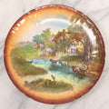 Lot 040 - Antique Hand Colored Transferware Decorative Plate Depicting Farm And Country Life Along A River, Franz Anton Mehlem Porcelain, Bonn, Germany, Circa Late 19th Century, 8-1/2" Diameter