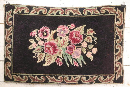 Lot 041 - Vintage Rectangular Hooked Rug With Many Colors Of Flowers, Black Surround With Low Contrast Purple Decorative Fill, Scroll Motif Border, 37-1/4" x 24-1/4"