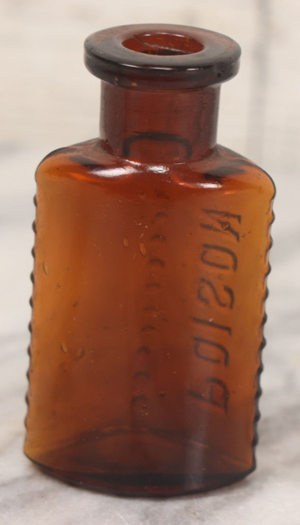 Lot 044 - Grouping Of Three Vintage Amber Glass Poison Bottles Including Tincture Of Iodine Bottle With Skull And Crossbones, Others With Embossed "Poison" Lettering, 2" and 3-5/8" Heights