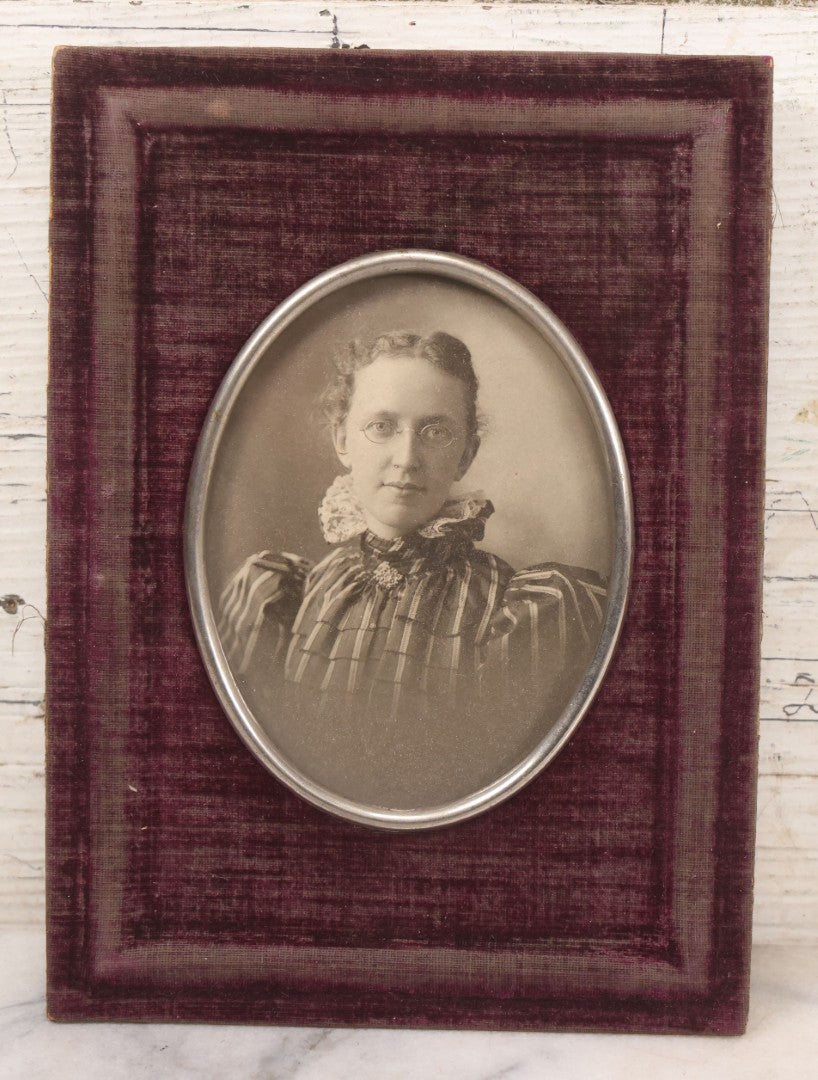 Lot 069 - Antique Purple Velvet Covered Photo Frame With Photograph Of Young Woman With Glasses, Note No Kickstand, Worn Velvet, 6" x 8-1/4"