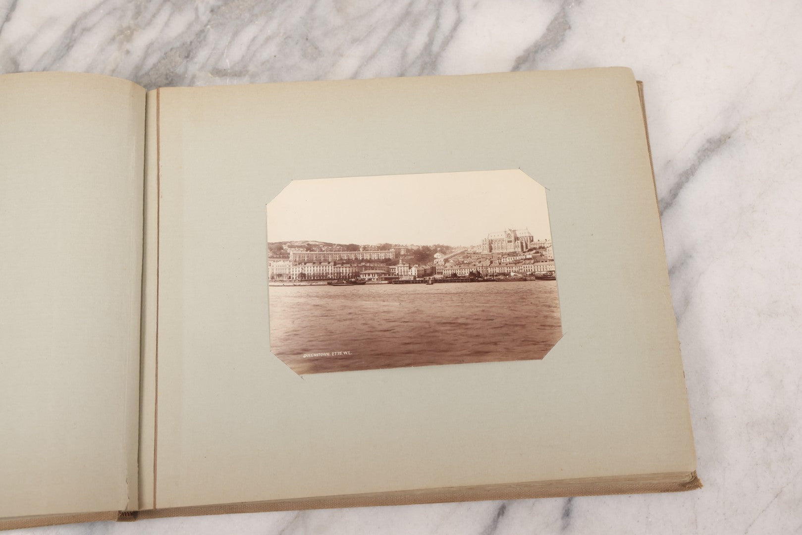 Lot 070 - Antique Photo Album With Approximately 80 Souvenir Photographs Of Landmarks Around Europe, England Including Churches And Cathedrals, Bridges, Architecture, Interiors, And Graveyards, Contained In "The Photo-Bind" Trademarked Album By J.H.H.M.