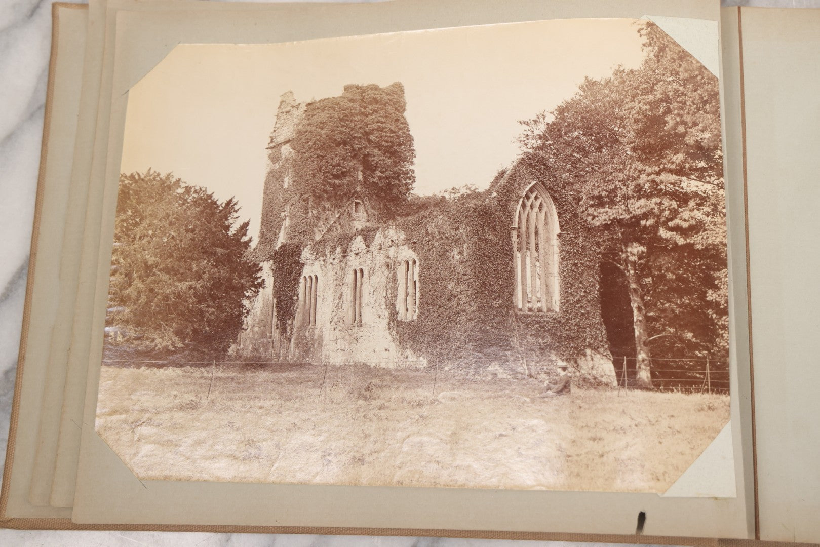 Lot 070 - Antique Photo Album With Approximately 80 Souvenir Photographs Of Landmarks Around Europe, England Including Churches And Cathedrals, Bridges, Architecture, Interiors, And Graveyards, Contained In "The Photo-Bind" Trademarked Album By J.H.H.M.