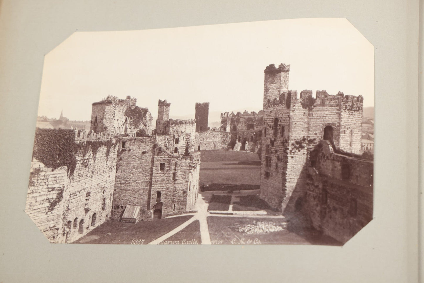 Lot 070 - Antique Photo Album With Approximately 80 Souvenir Photographs Of Landmarks Around Europe, England Including Churches And Cathedrals, Bridges, Architecture, Interiors, And Graveyards, Contained In "The Photo-Bind" Trademarked Album By J.H.H.M.