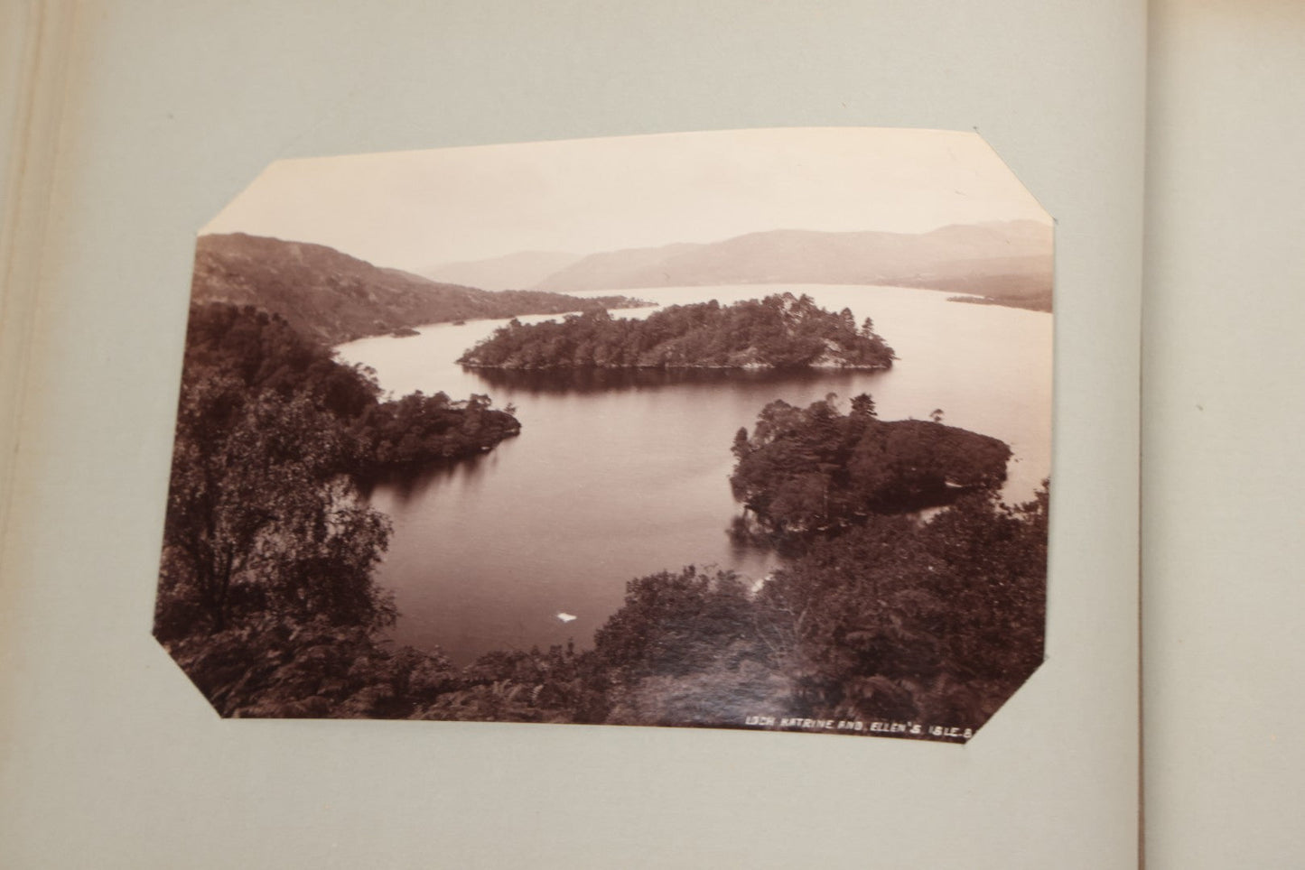 Lot 070 - Antique Photo Album With Approximately 80 Souvenir Photographs Of Landmarks Around Europe, England Including Churches And Cathedrals, Bridges, Architecture, Interiors, And Graveyards, Contained In "The Photo-Bind" Trademarked Album By J.H.H.M.