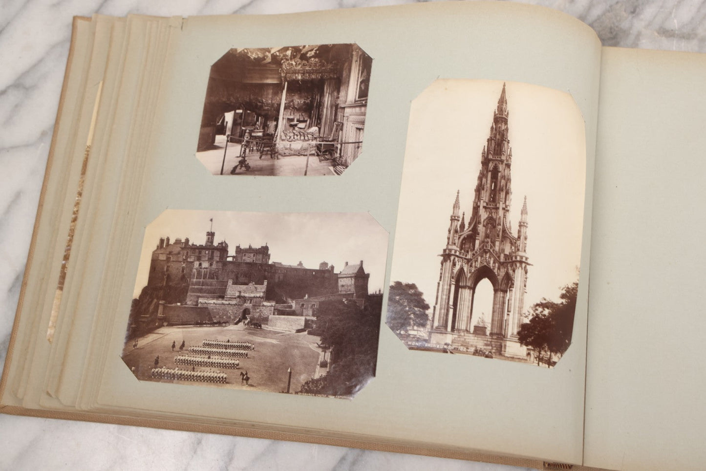 Lot 070 - Antique Photo Album With Approximately 80 Souvenir Photographs Of Landmarks Around Europe, England Including Churches And Cathedrals, Bridges, Architecture, Interiors, And Graveyards, Contained In "The Photo-Bind" Trademarked Album By J.H.H.M.