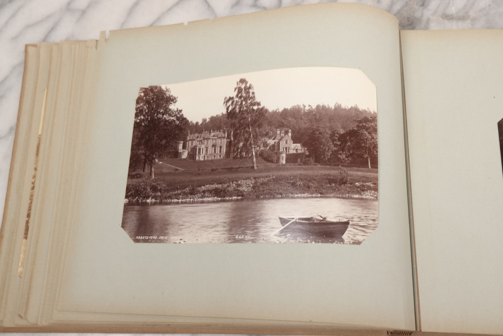 Lot 070 - Antique Photo Album With Approximately 80 Souvenir Photographs Of Landmarks Around Europe, England Including Churches And Cathedrals, Bridges, Architecture, Interiors, And Graveyards, Contained In "The Photo-Bind" Trademarked Album By J.H.H.M.