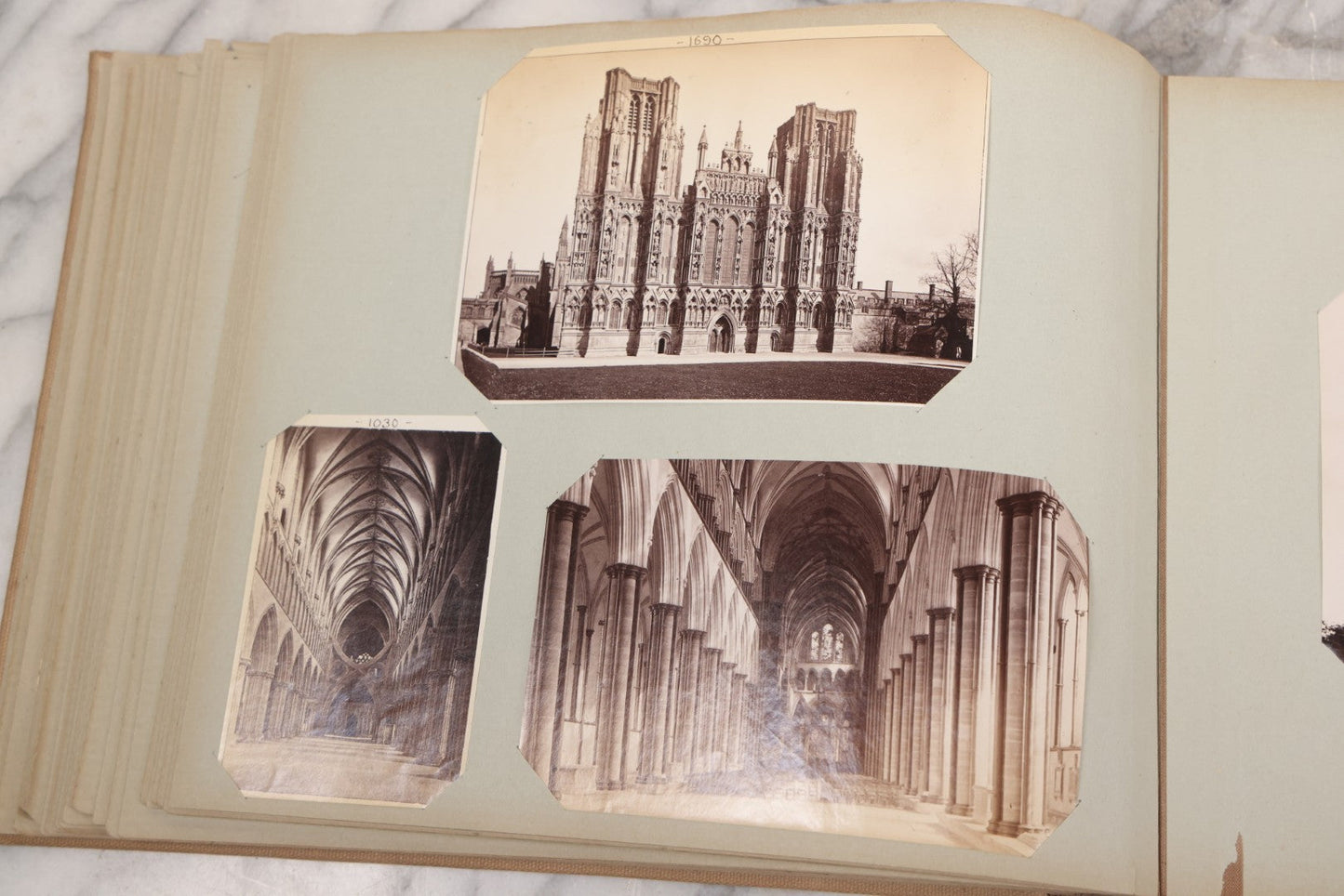 Lot 070 - Antique Photo Album With Approximately 80 Souvenir Photographs Of Landmarks Around Europe, England Including Churches And Cathedrals, Bridges, Architecture, Interiors, And Graveyards, Contained In "The Photo-Bind" Trademarked Album By J.H.H.M.