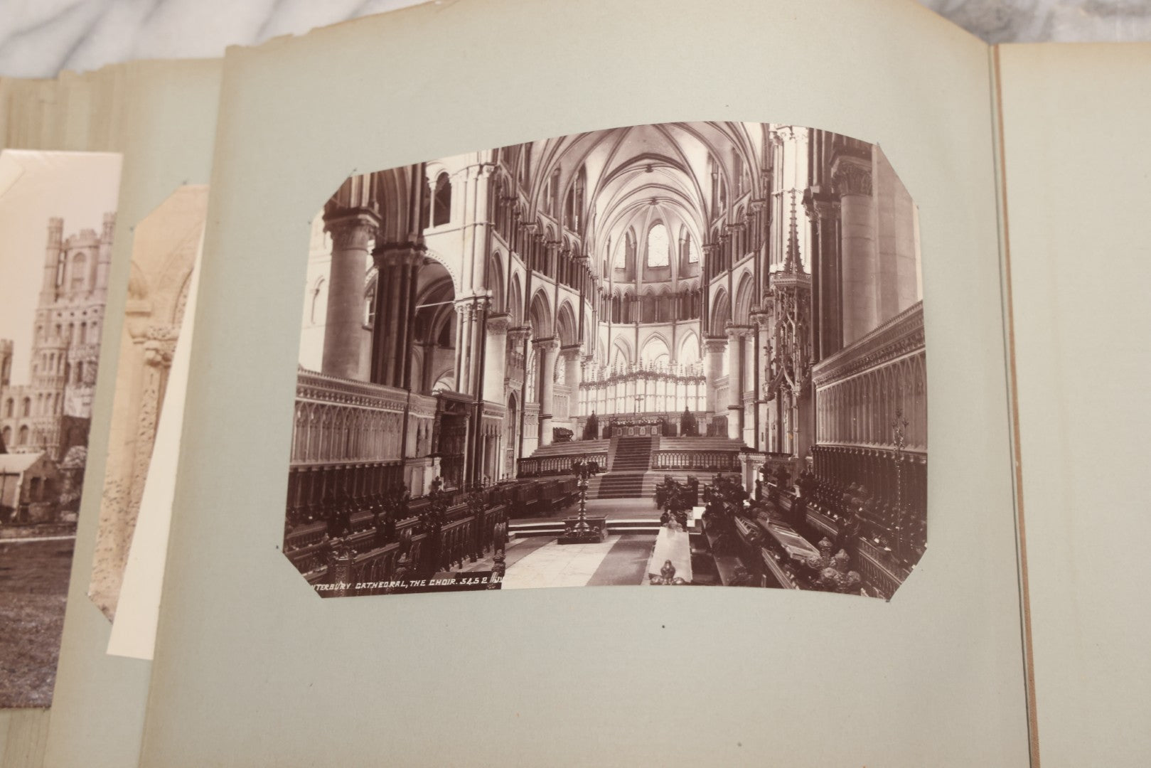 Lot 070 - Antique Photo Album With Approximately 80 Souvenir Photographs Of Landmarks Around Europe, England Including Churches And Cathedrals, Bridges, Architecture, Interiors, And Graveyards, Contained In "The Photo-Bind" Trademarked Album By J.H.H.M.