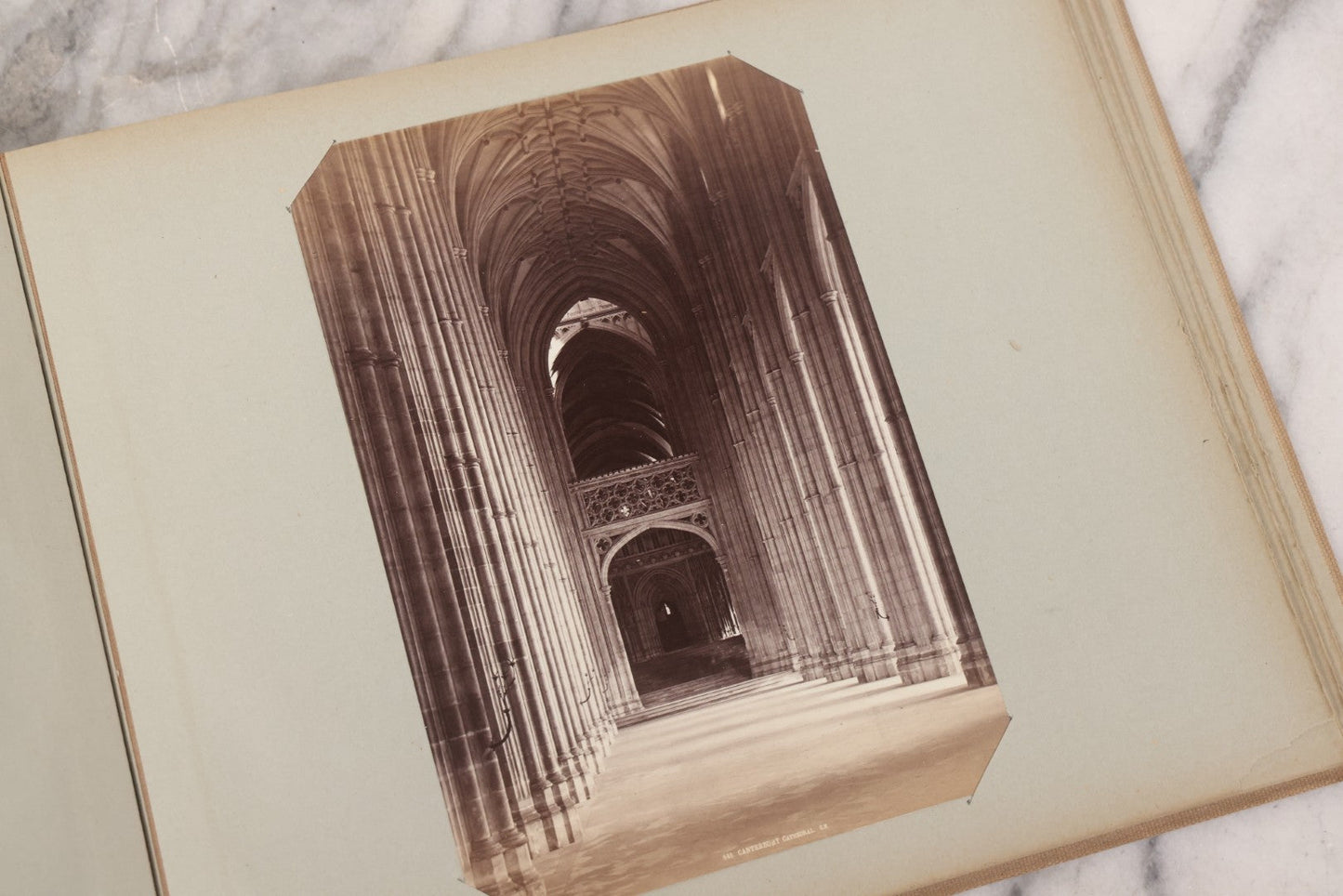 Lot 070 - Antique Photo Album With Approximately 80 Souvenir Photographs Of Landmarks Around Europe, England Including Churches And Cathedrals, Bridges, Architecture, Interiors, And Graveyards, Contained In "The Photo-Bind" Trademarked Album By J.H.H.M.