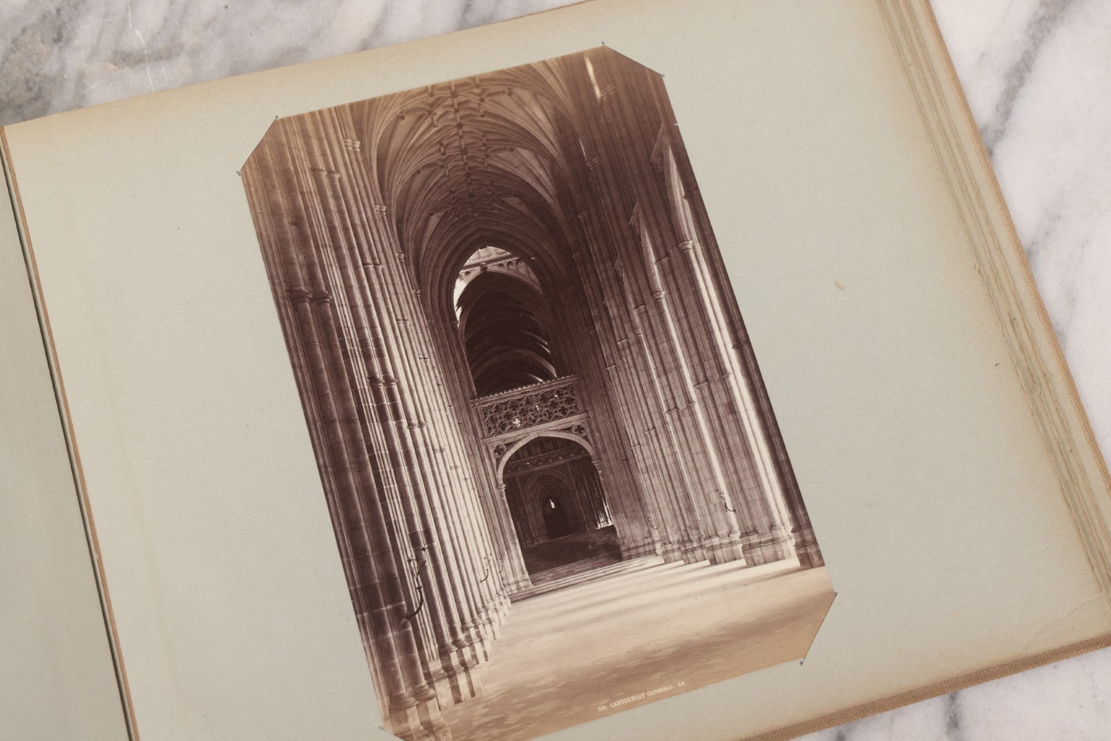 Lot 070 - Antique Photo Album With Approximately 80 Souvenir Photographs Of Landmarks Around Europe, England Including Churches And Cathedrals, Bridges, Architecture, Interiors, And Graveyards, Contained In "The Photo-Bind" Trademarked Album By J.H.H.M.