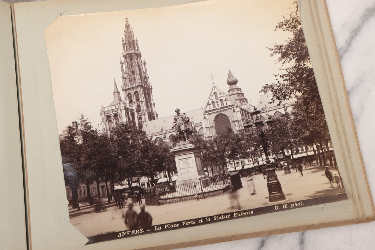 Lot 070 - Antique Photo Album With Approximately 80 Souvenir Photographs Of Landmarks Around Europe, England Including Churches And Cathedrals, Bridges, Architecture, Interiors, And Graveyards, Contained In "The Photo-Bind" Trademarked Album By J.H.H.M.