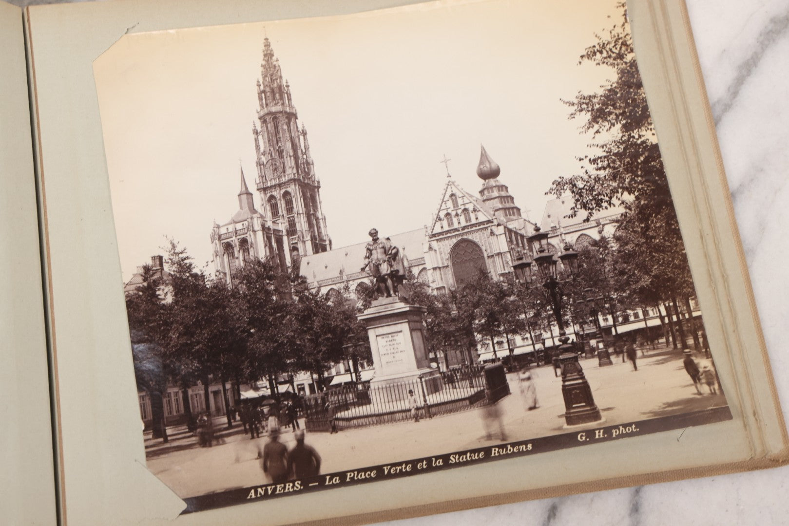 Lot 070 - Antique Photo Album With Approximately 80 Souvenir Photographs Of Landmarks Around Europe, England Including Churches And Cathedrals, Bridges, Architecture, Interiors, And Graveyards, Contained In "The Photo-Bind" Trademarked Album By J.H.H.M.