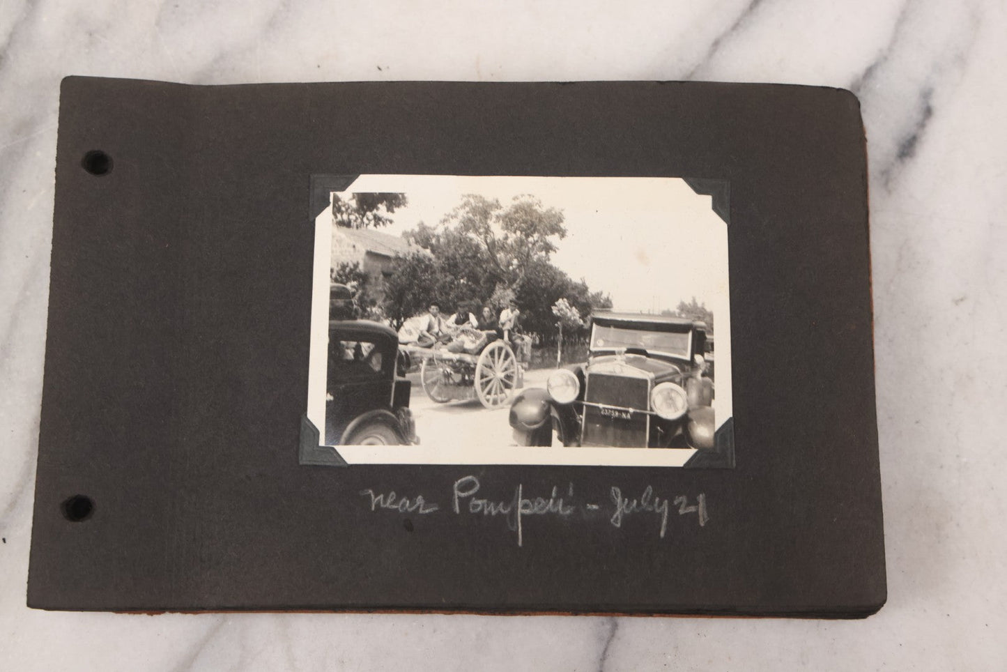 Lot 072 - Vintage Snapshot Photo Album Containing 85+ Photographs, Mostly Of Travel In Italy, Including Pompeii, Rome, Gelati Vendors, The Colosseum, Venice, As Well As Photographs Of The Netherlands, Edinburgh, And More, Note All Page Loose