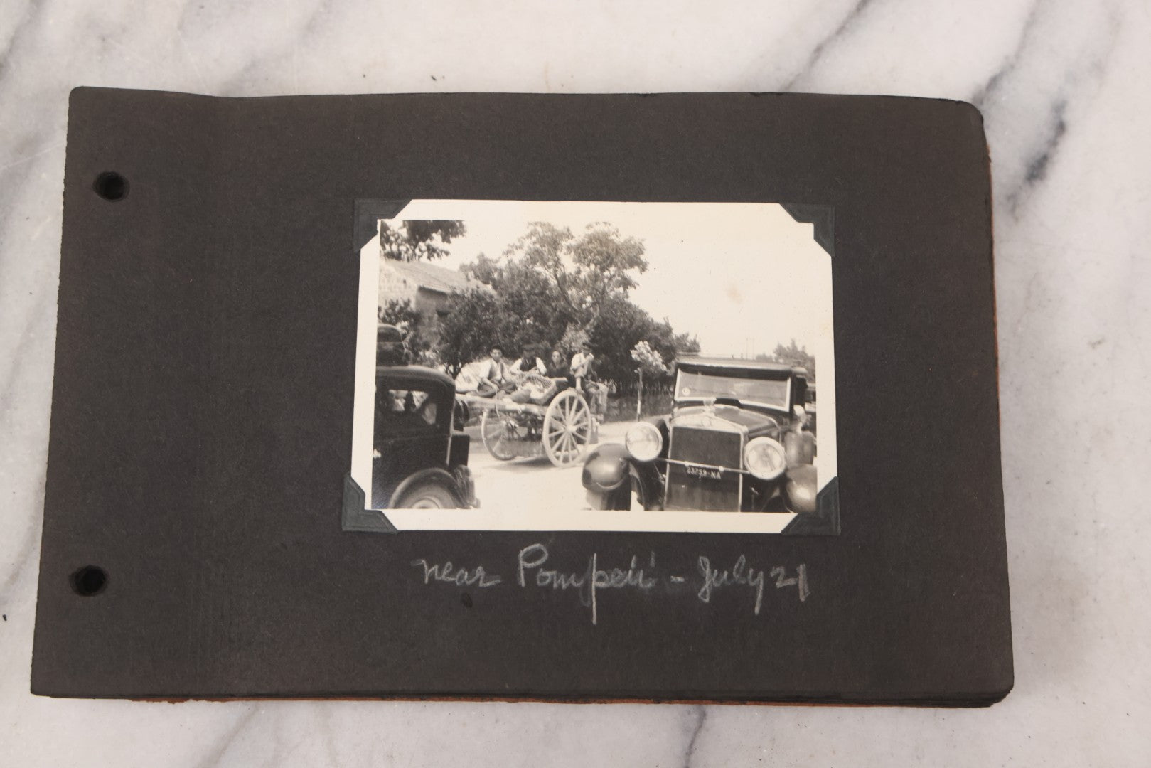 Lot 072 - Vintage Snapshot Photo Album Containing 85+ Photographs, Mostly Of Travel In Italy, Including Pompeii, Rome, Gelati Vendors, The Colosseum, Venice, As Well As Photographs Of The Netherlands, Edinburgh, And More, Note All Page Loose