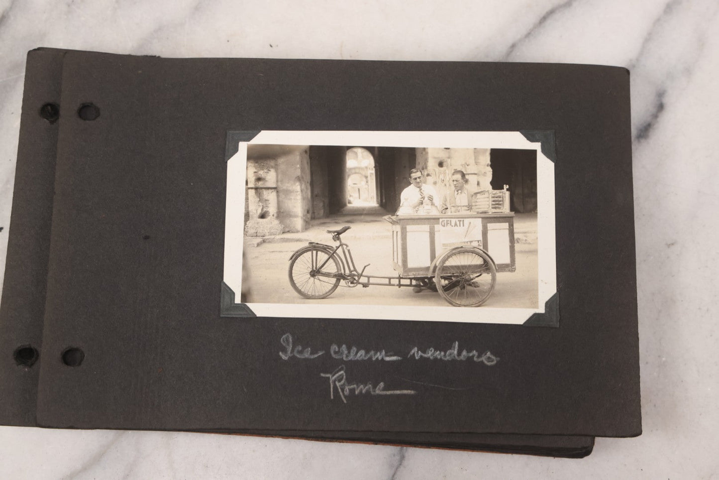 Lot 072 - Vintage Snapshot Photo Album Containing 85+ Photographs, Mostly Of Travel In Italy, Including Pompeii, Rome, Gelati Vendors, The Colosseum, Venice, As Well As Photographs Of The Netherlands, Edinburgh, And More, Note All Page Loose