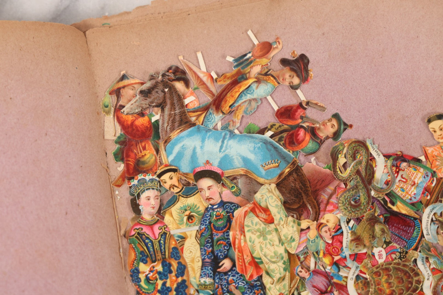 Lot 075 - Antique Die Cut Scrap Collection In Delicate Scrapbook, Containing Dozens Of Pieces, Mostly Made In Germany, Including People, Animals, Flowers, And Other Subjects, Not Glued To Book