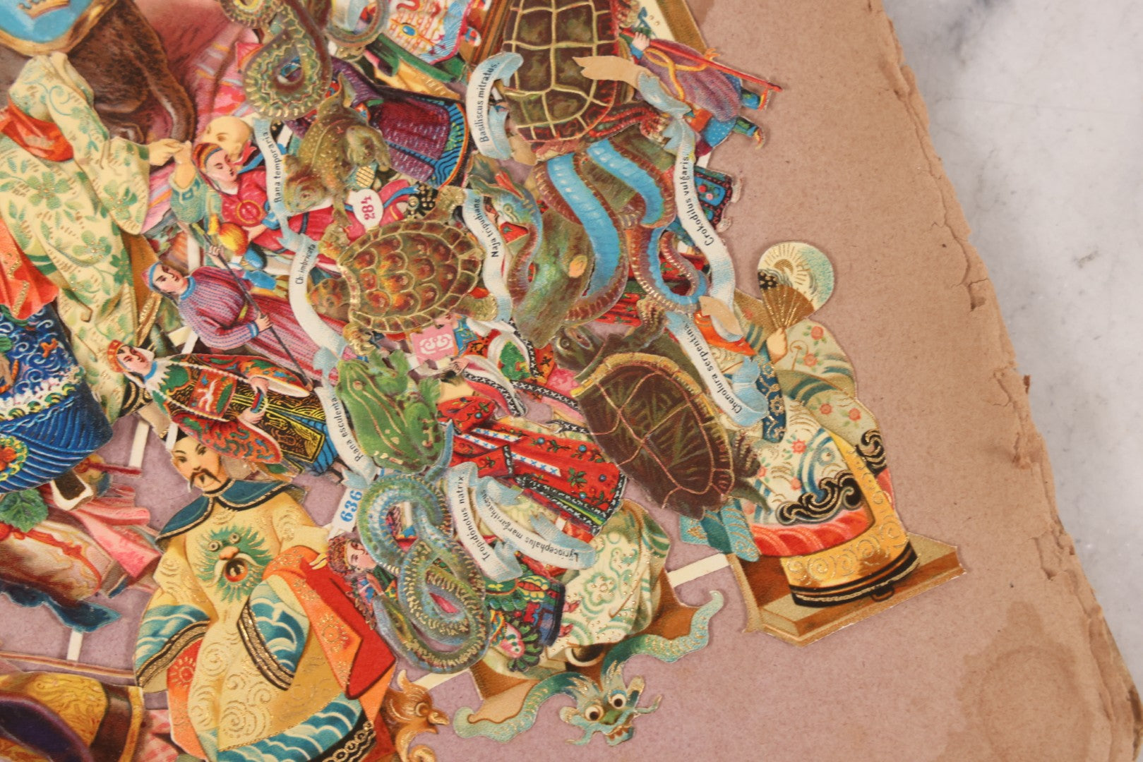 Lot 075 - Antique Die Cut Scrap Collection In Delicate Scrapbook, Containing Dozens Of Pieces, Mostly Made In Germany, Including People, Animals, Flowers, And Other Subjects, Not Glued To Book