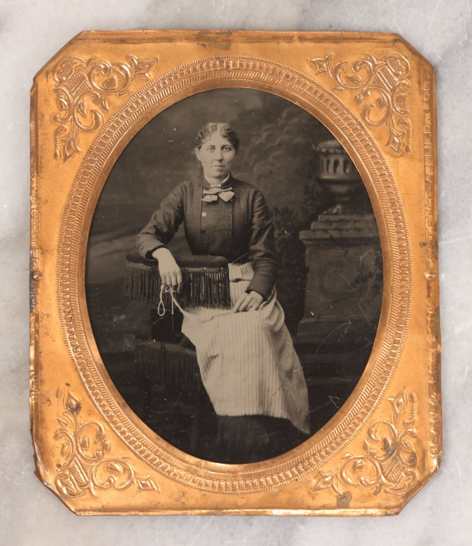 Lot 088 - Pair Of Antique Tintype Photographs Of Women Engaged In Knitting, Sewing Activities, Including Elderly Woman In Bonnet And Tintype In Brass Mat From French & Sawyer's Daguerreian Gallery, Keene, New Hampshire